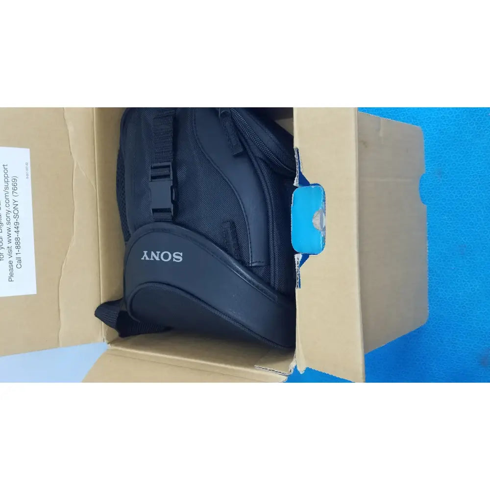 Black sony camera bag with textured fabric exterior and white logo for sony cyber-shot dsc-f828 digital still camera