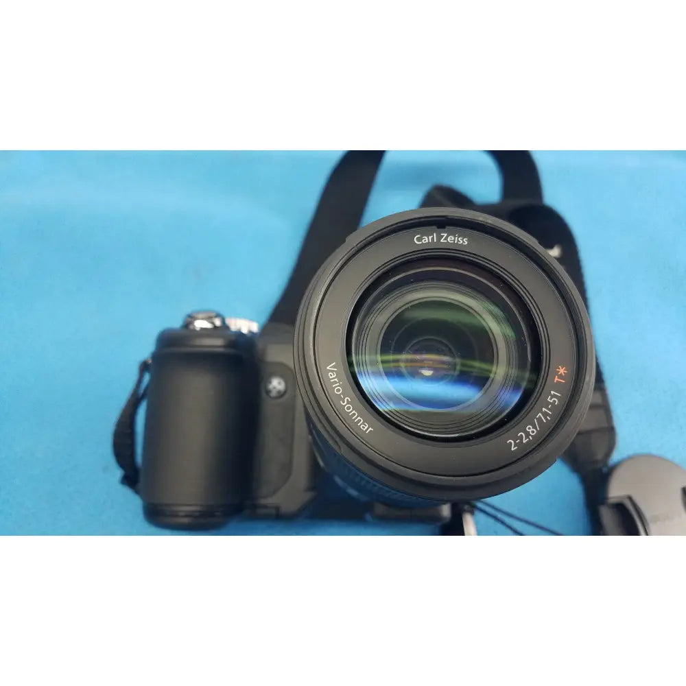 Black sony cyber-shot dsc-f828 digital camera with carl zeiss vario-sonnar t star lens and matte finish for professional use