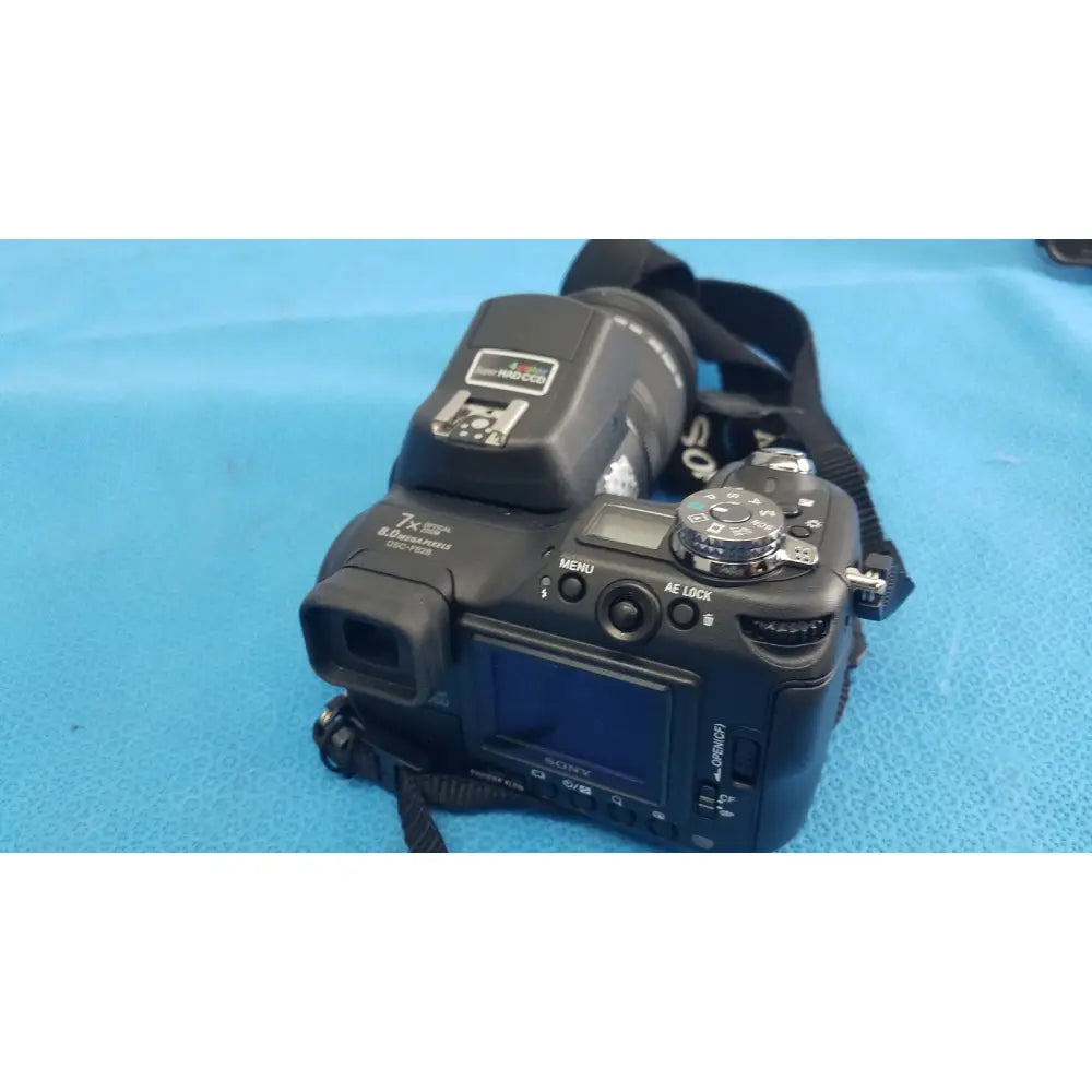 Black sony cyber-shot dsc-f828 digital camera with 7x optical zoom and built-in flash with ac power adapter
