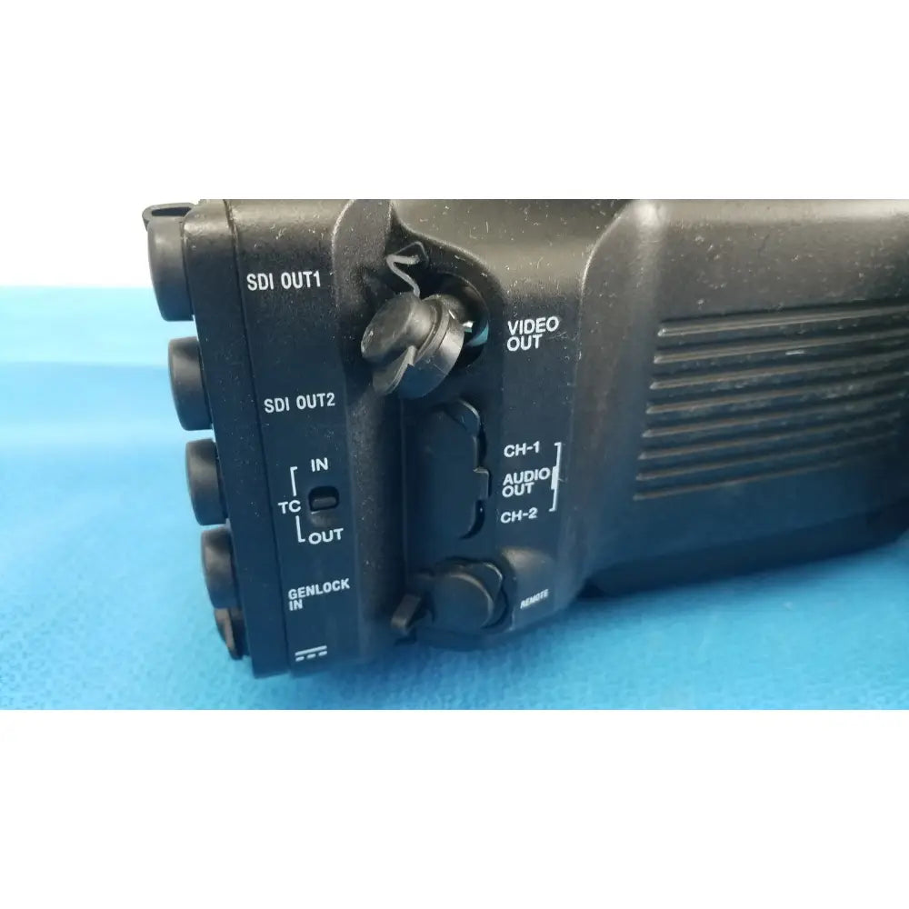Black sony pmw-300 memory xdcam camcorder showing multiple output ports including sdi and audio jacks on the back side