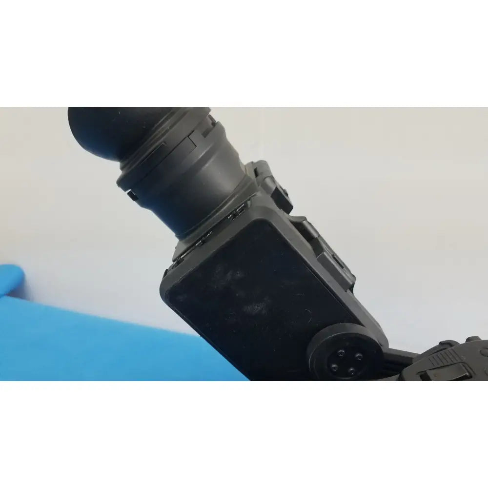 Black plastic camera lens mount with matte finish and screw holes on sony pmw-300 memory xdcam camcorder back side