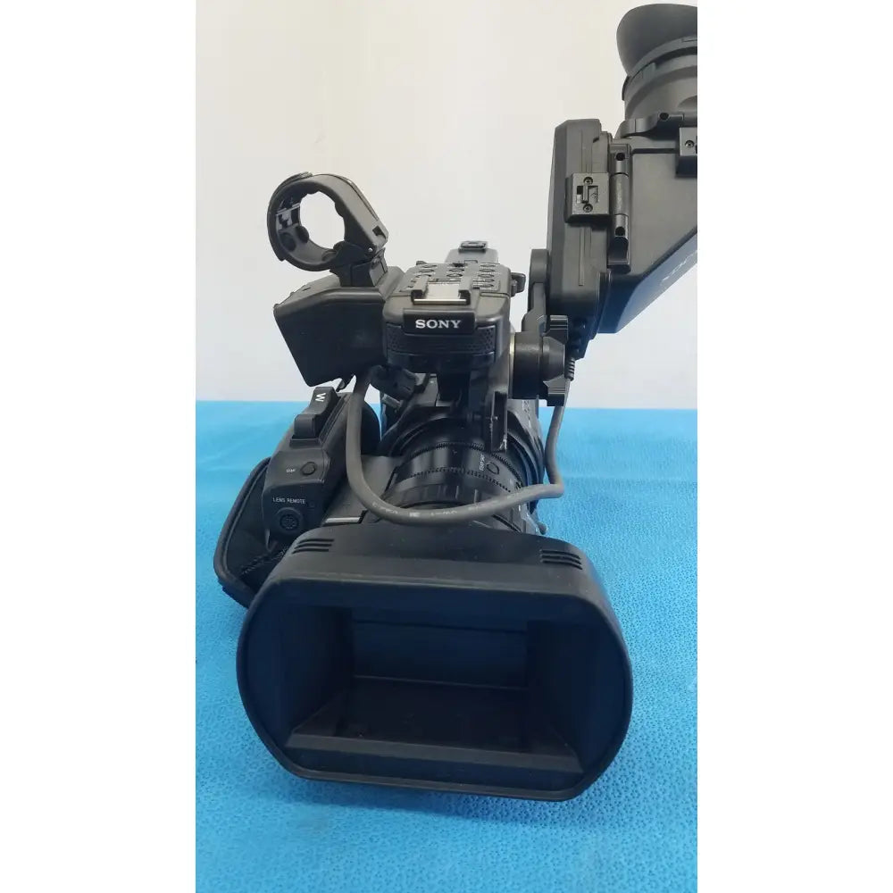 Black sony pmw-300 solid-state memory xdcam camcorder with large lens and attached viewfinder for professional use