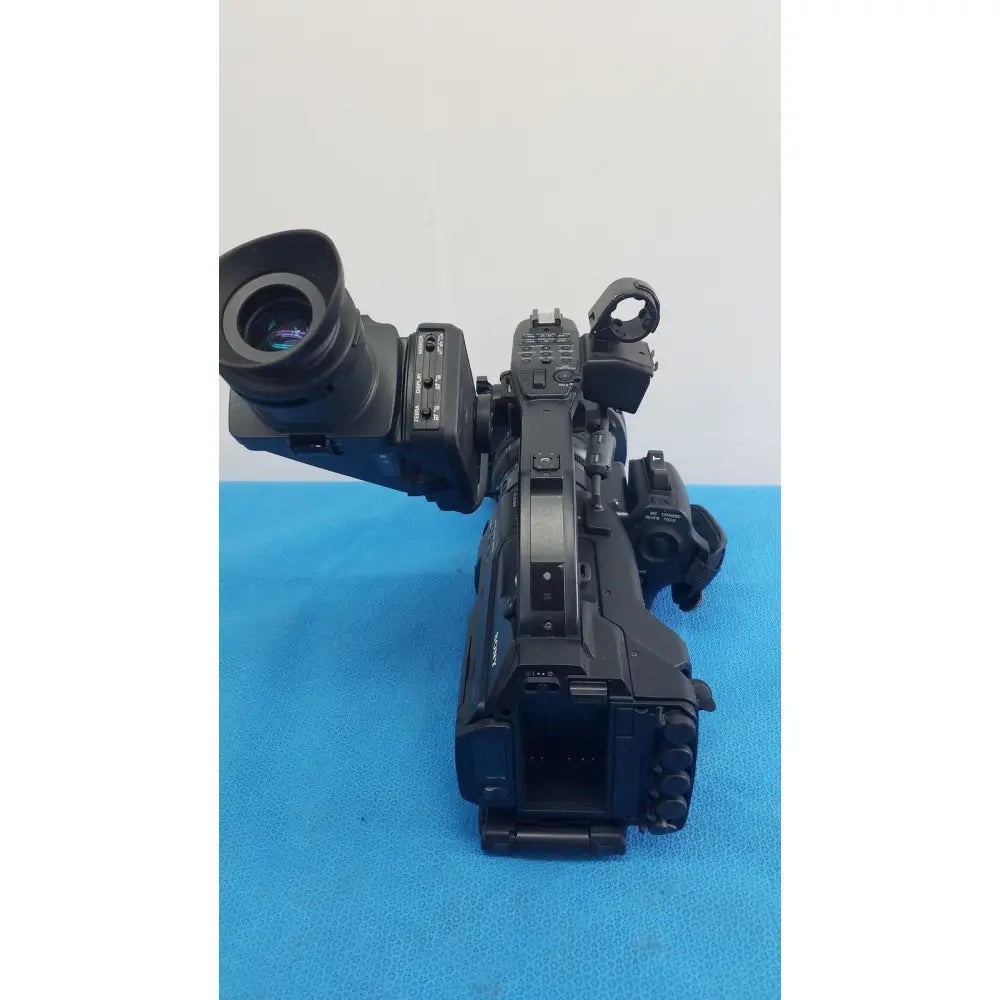 Sony PMW-300 black professional memory xdcam camcorder with large lens and multiple control dials for video recording