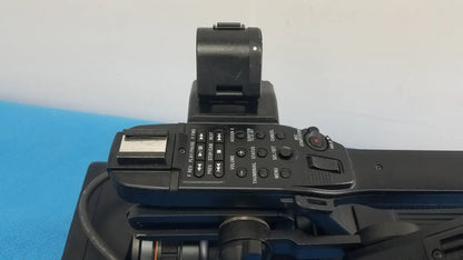 Black canon camera with built-in flash and multiple control buttons for sony pmw-300 memory xdcam camcorder use