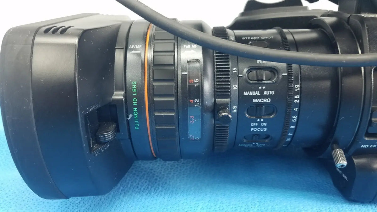 Black fujifilm hd lens with orange accent and control dials featured on sony pmw-300 memory xdcam camcorder