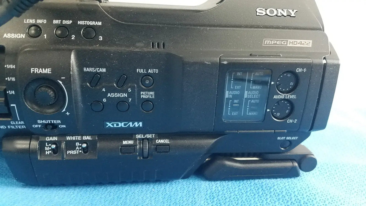 Black sony pmw-300 memory xdcam camcorder with matte finish, control dials, buttons, and small lcd screen