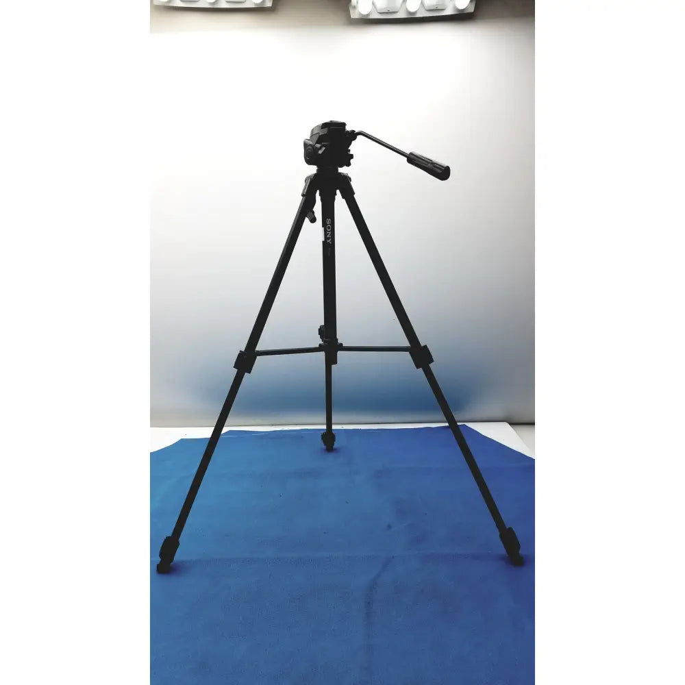 Black sony lightweight extendable video tripod with three extendable legs and camera mount for stable shooting