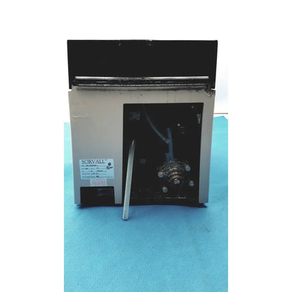 Sorvall cell washer centrifuge cell washing system with beige body, black panels, and visible internal tubing and fixtures