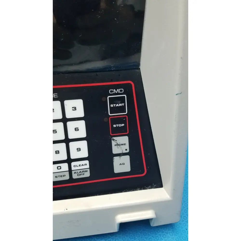 Black control panel with white buttons and red border on sorvall cell washer centrifuge cell washing system 3600 rpm