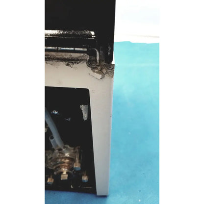 White plastic electrical box with black interior and wiring showing wear on the back of sorvall cell washer centrifuge cell washing system