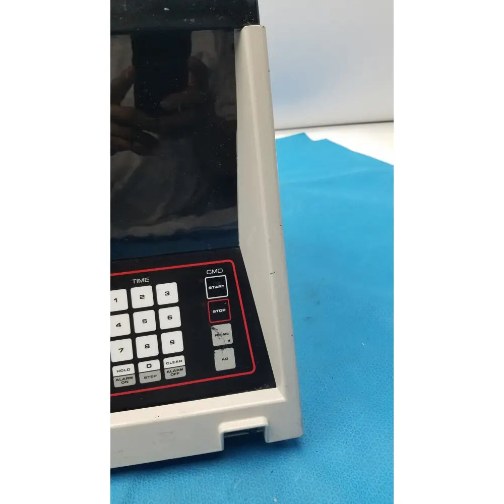 White plastic digital timer with black keypad and red accents for sorvall cell washer centrifuge cell washing system