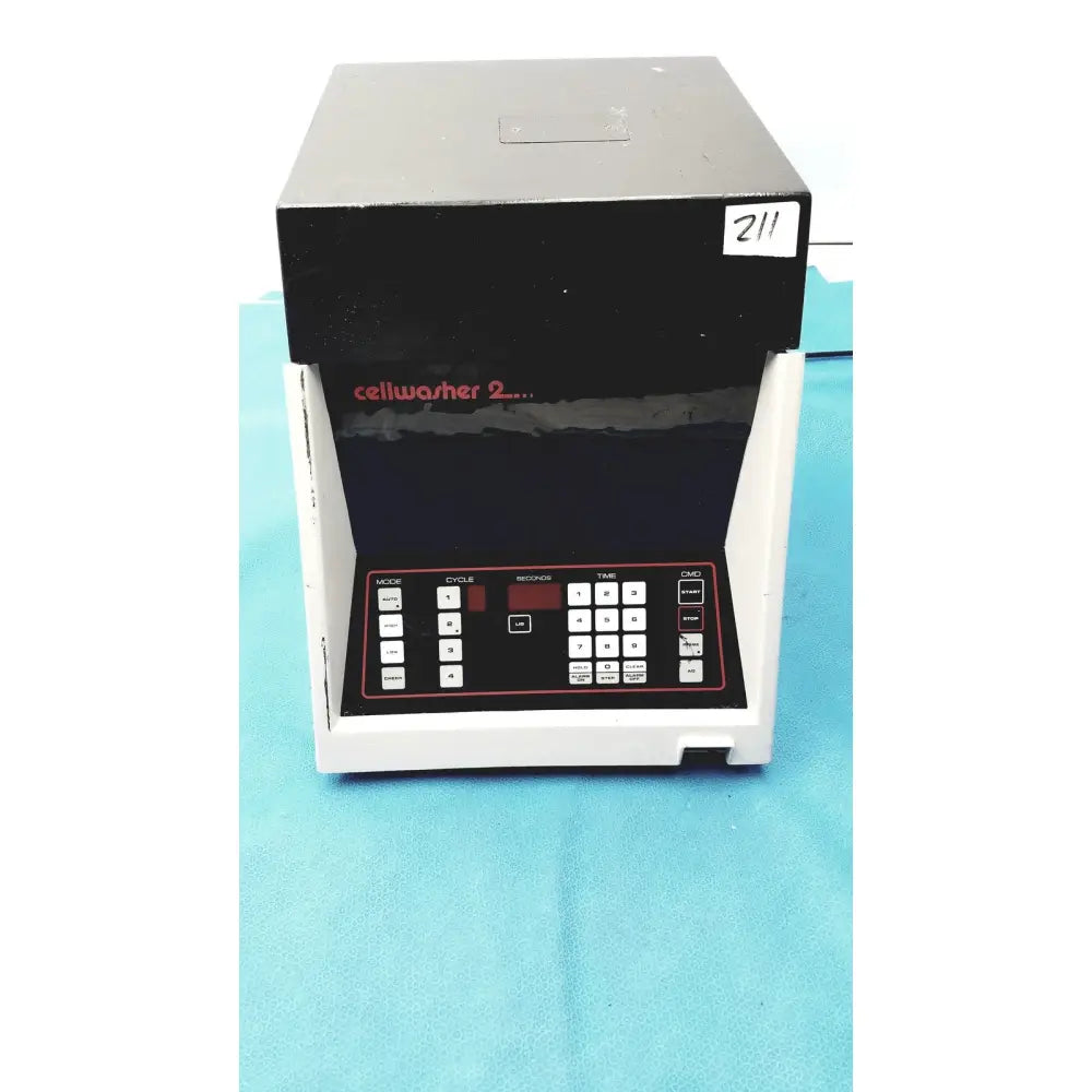 Black and white Sorvall cell washer machine with red labeling for centrifuge cell washing at 3600 RPM