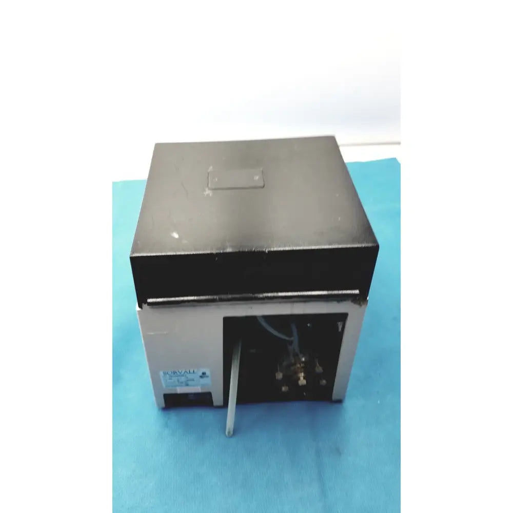 Black and silver rectangular sorvall cell washer with small top handle for centrifuge cell washing at 3600 rpm