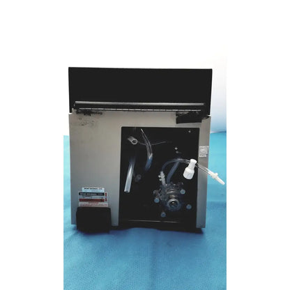 Silver-colored metal sorvall instruments cell washer 2 with black components and transparent tubing for laboratory use