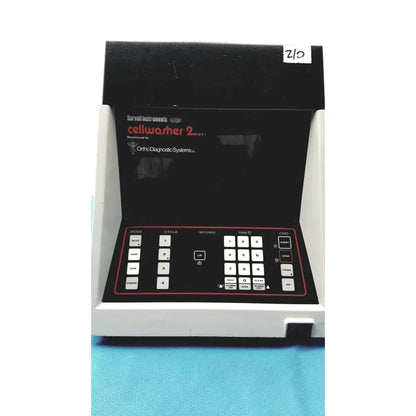 Sorvall instruments cell washer 2 automated black and white machine with red-accented control panel for cell washing