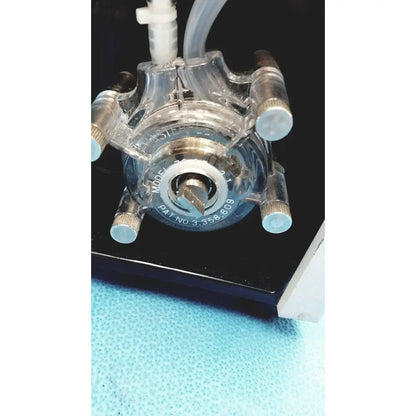 Clear plastic syringe pump with metallic fittings and adjustment knob for sorvall instruments cell washer 2 8603815