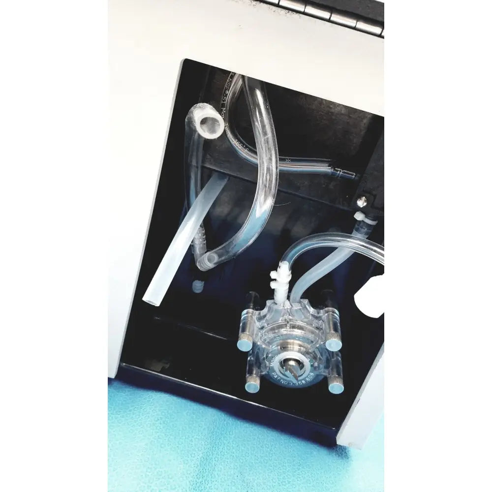 Clear plastic fluid pump with transparent tubing and metallic fittings on sorvall instruments cell washer 2 8603815