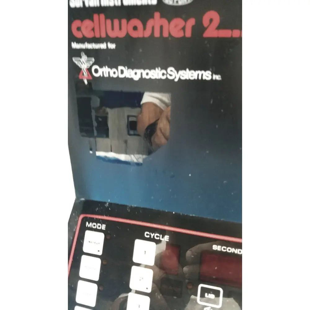 Black sorvall instruments cell washer 2 device with red and white labeling for ortho diagnostic systems inc use