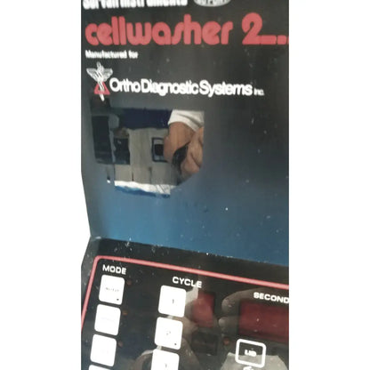 Black sorvall instruments cell washer 2 device with red and white labeling for ortho diagnostic systems inc use
