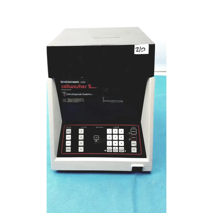 Sorvall instruments cell washer 2 in gray and black with a keypad featuring red-bordered buttons for precise control