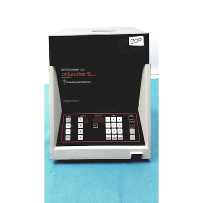 Black and gray sorvall instruments cell washer 2.0 medical device with keypad and display panel for lab use