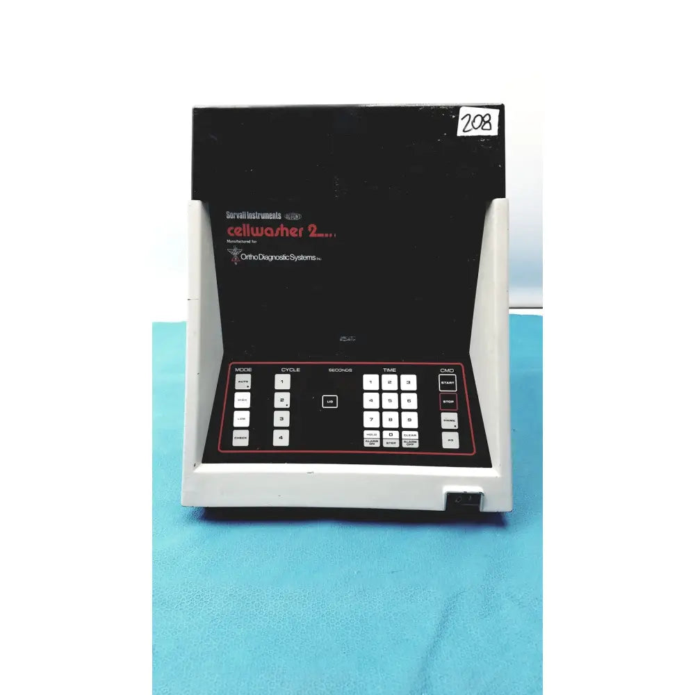 Black and white sorvall instruments cell washer 2 medical device with red lettering and keypad panel for cycle control