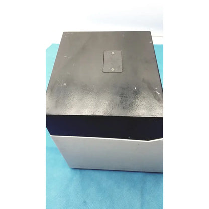 Black and silver rectangular sorvall instruments cell washer 2 with matte finish top panel and two screws visible