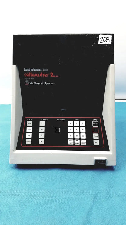 Black and white sorvall instruments cell washer 2 medical device with red lettering and keypad panel for cycle control