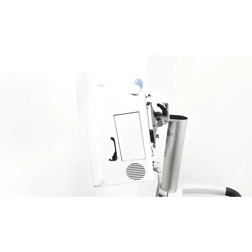 White wall-mounted spacelabs healthcare ultraview sl model patient monitor with silver cylindrical attachment