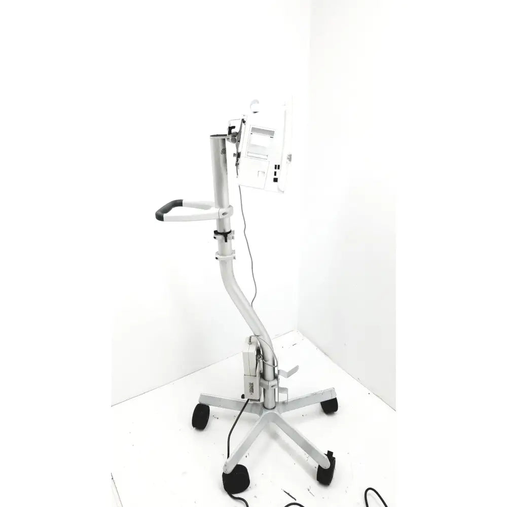 Spacelabs healthcare ultraview sl model patient monitor with silver medical examination table adjustable arm and wheels