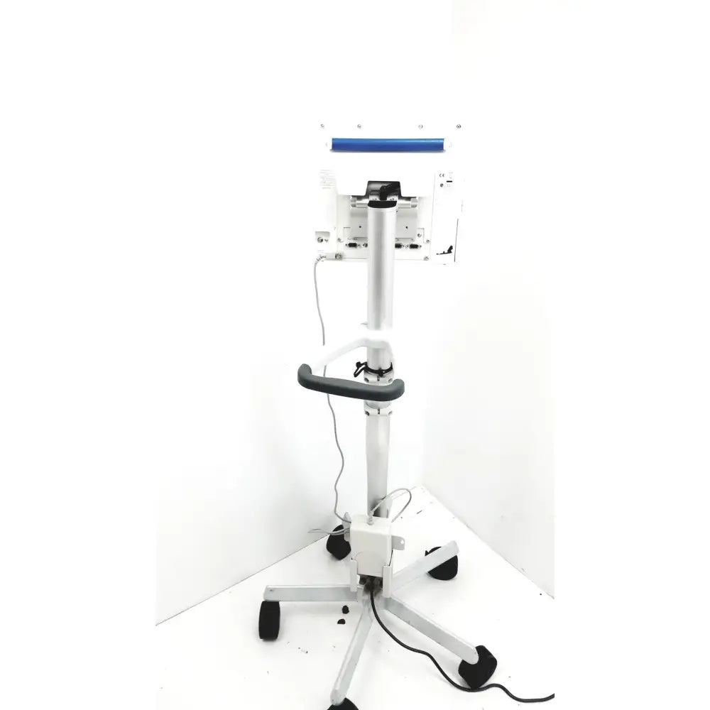 White medical examination table with blue bar and black wheels for spacelabs healthcare ultraview sl model patient monitor stand