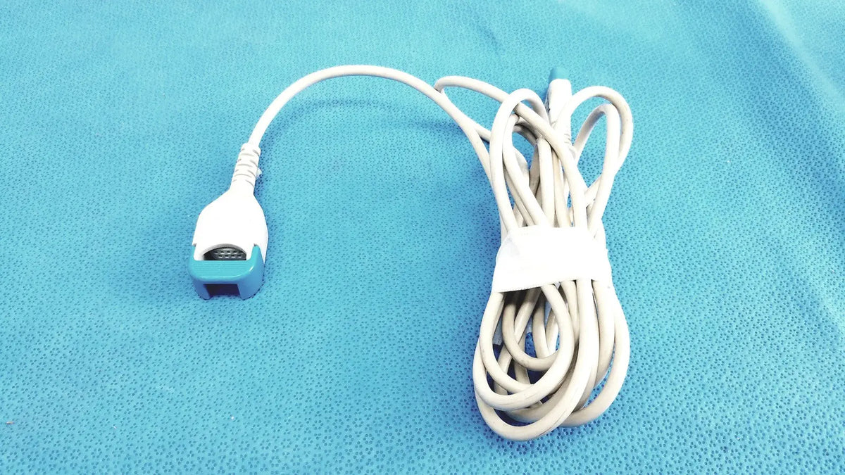 White and light blue medical pulse oximeter cable with coiled design spacelabs medical extension adapter cable 700-0030-00