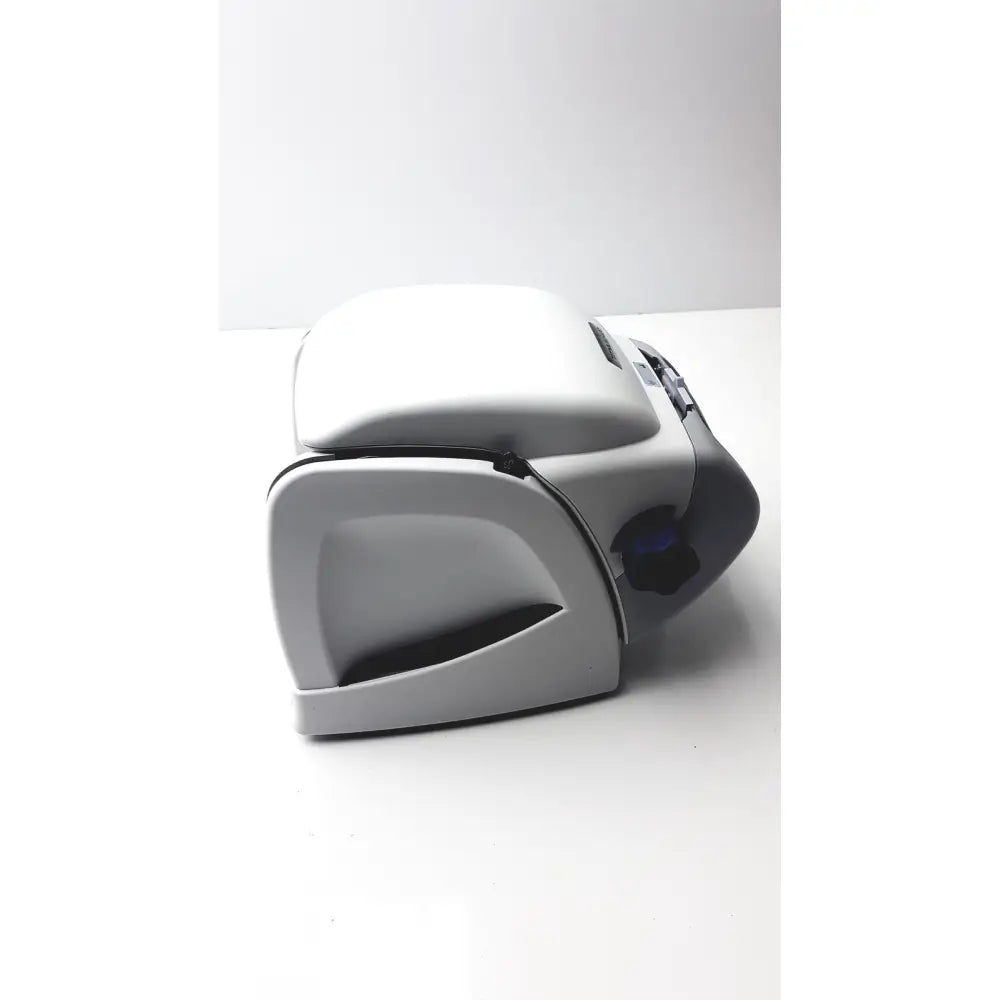 Gray plastic car center console with black accents as part of sperian titmus i300 vision screening system design