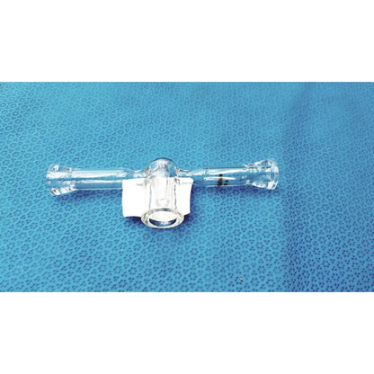 Clear glass spherical joint glass stopcock valve made of borosilicate with central connector and side ports for lab vacuum