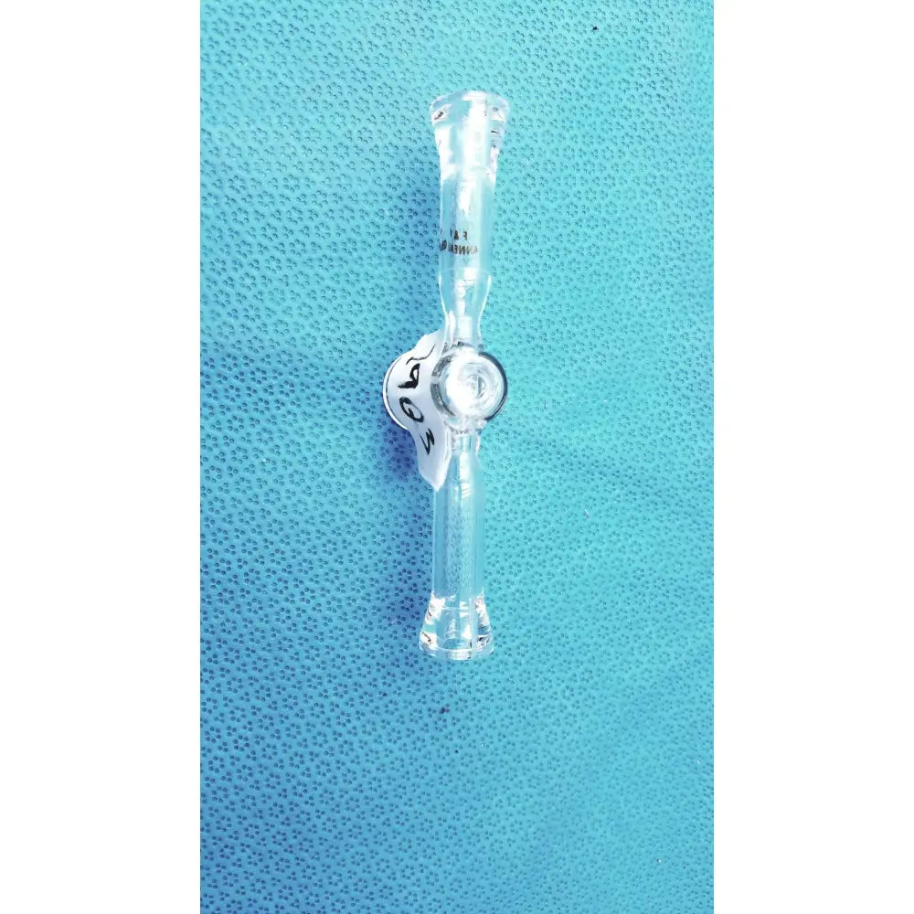 Clear spherical joint glass stopcock valve made of borosilicate with white label and black text for lab vacuum use