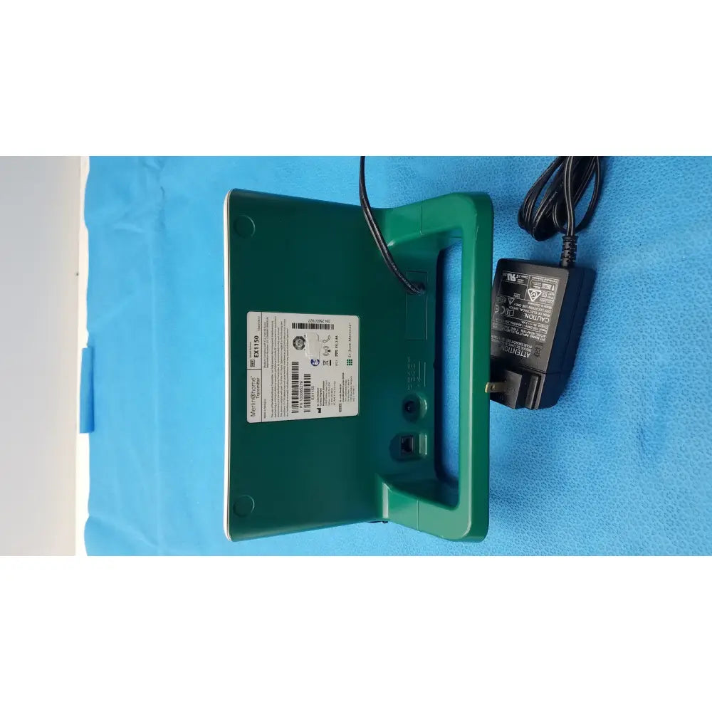 Green plastic st jude ex1150 wifi transmitter unit with handle power cord and white label on its back side
