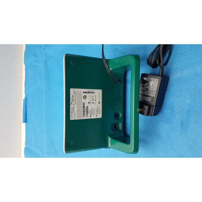 Green plastic st jude ex1150 wifi transmitter unit with handle power cord and white label on its back side