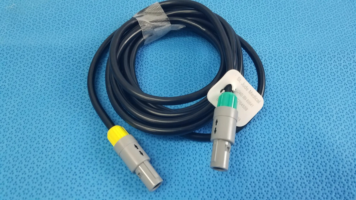 Black coiled medical equipment catheter connection cable with gray connectors and yellow green accents for reuse medical equipment