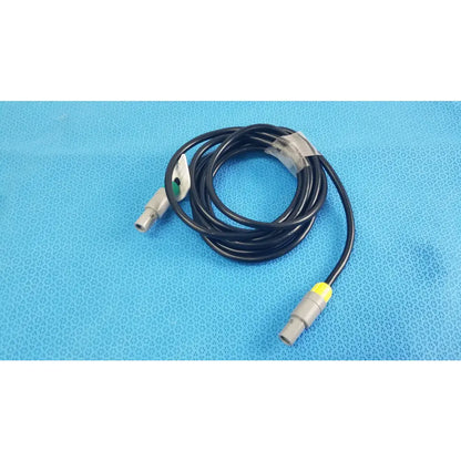 Black coiled catheter connection cable with gray connectors and yellow accent for reuse medical equipment by St Jude Medical