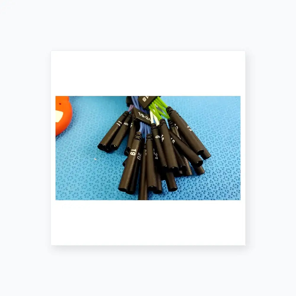 Black cylindrical heat shrink tubing with white numerical markings on St Jude Medical IBI-85931 diagnostic connecting cable