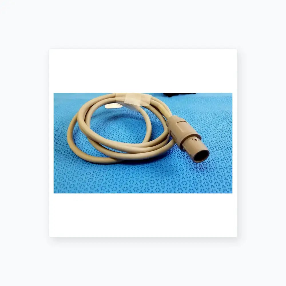 Beige medical-grade jude medical inquiry diagnostic connecting cable with molded plastic connector and protective tape