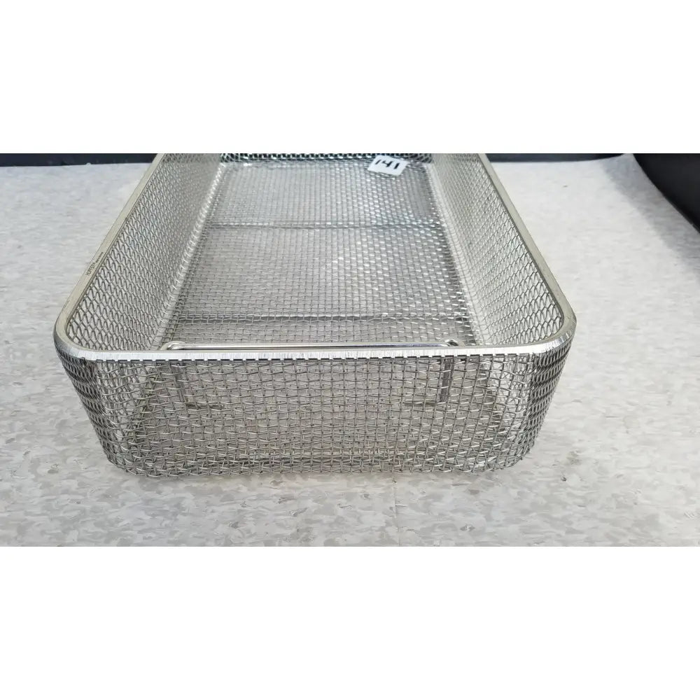 Rectangular stainless steel basket with sturdy interwoven mesh and reinforced edges for sterilization use