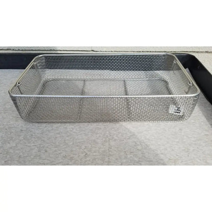 Rectangular stainless steel basket for sterilization case with mesh design, reinforced handles, and internal partitions