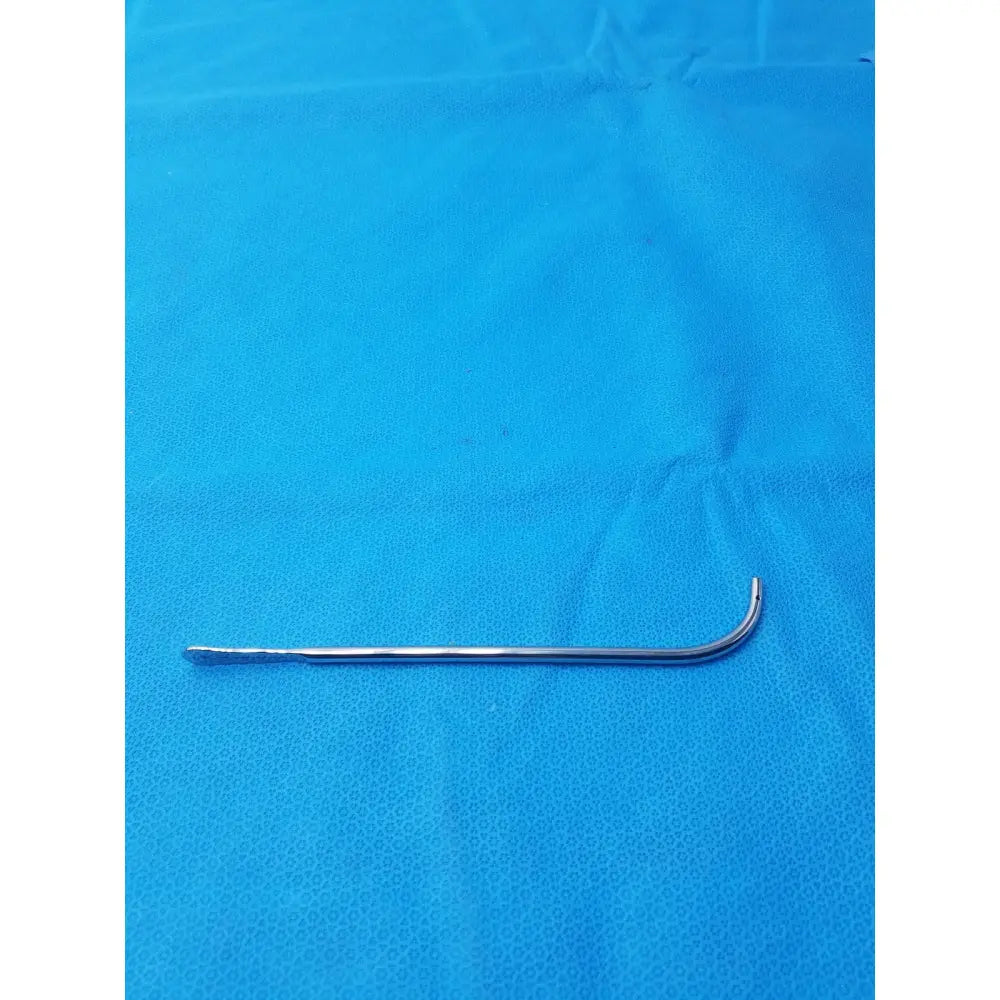 Silver stainless steel curved surgical instrument with slender design and polished finish for precise medical use