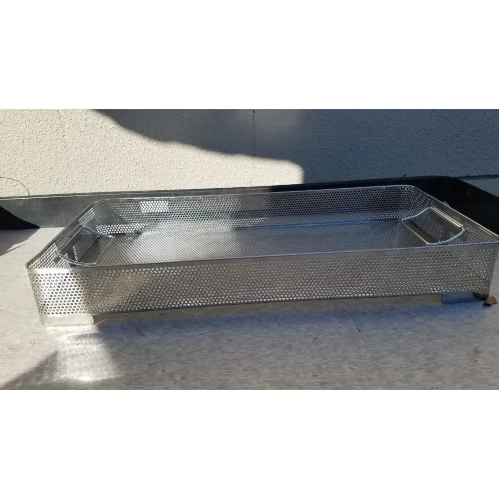Rectangular stainless steel instrument sterilization basket tray with perforated design and reinforced handles for durability