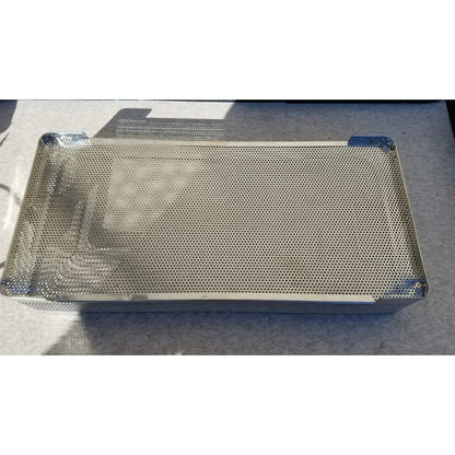 Rectangular stainless steel instrument sterilization basket tray with reinforced corners and uniform perforated surface