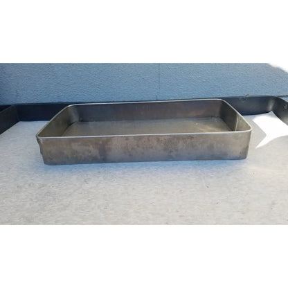 Rectangular stainless steel sterilization basket tray with mesh bottom and darkened surface for medical use