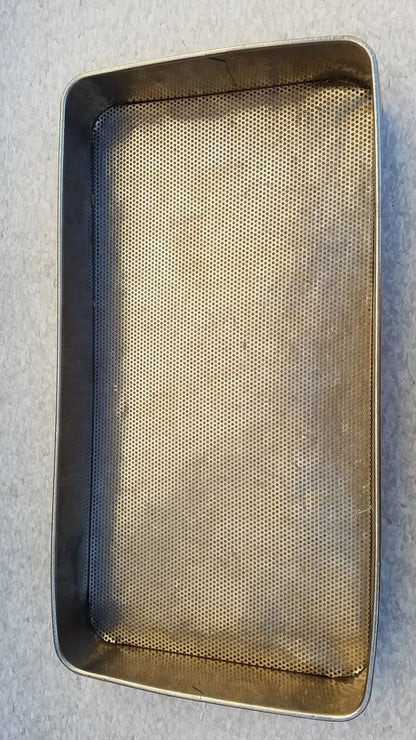 Rectangular stainless steel sterilization basket tray with silver-toned finish and uniform perforations for medical use