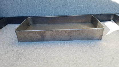Rectangular stainless steel sterilization basket tray with mesh bottom and darkened surface for medical use