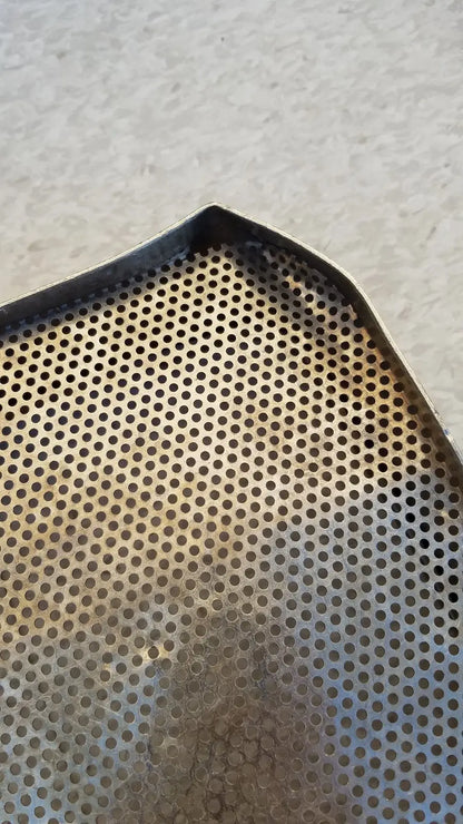 Silver perforated stainless steel sterilization basket tray with matte finish and rounded corners for steel sterilization